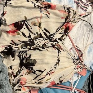 White with flowers buttons down the middle